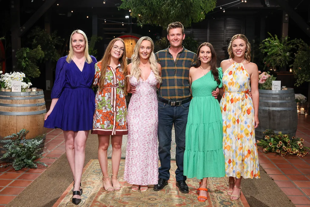 Farmer Tom with his five women of the season