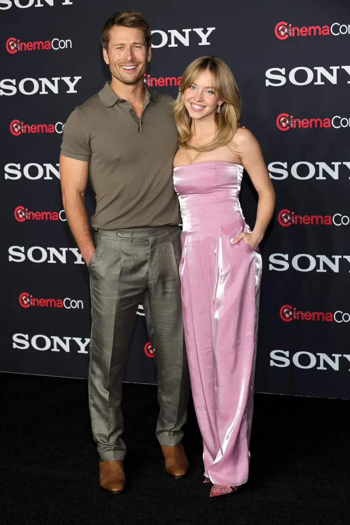LAS VEGAS, NEVADA - APRIL 24: (L-R) Glen Powell and Sydney Sweeney promote the upcoming film "Anyone But You" at the Sony Pictures Entertainment presentation during CinemaCon, the official convention of the National Association of Theatre Owners, at The Colosseum at Caesars Palace on April 24, 2023 in Las Vegas, Nevada. (Photo by Ethan Miller/Getty Images)