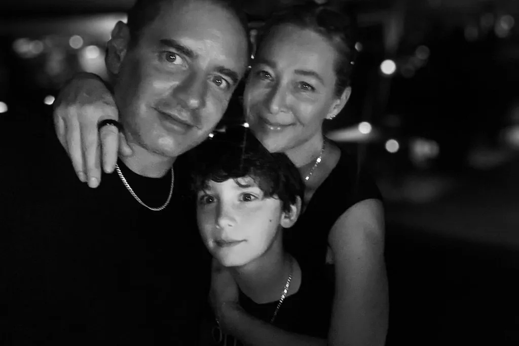 Asher Keddie with her husband and son