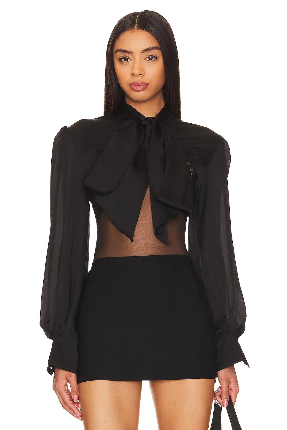Black pussy bow blouse on a model.