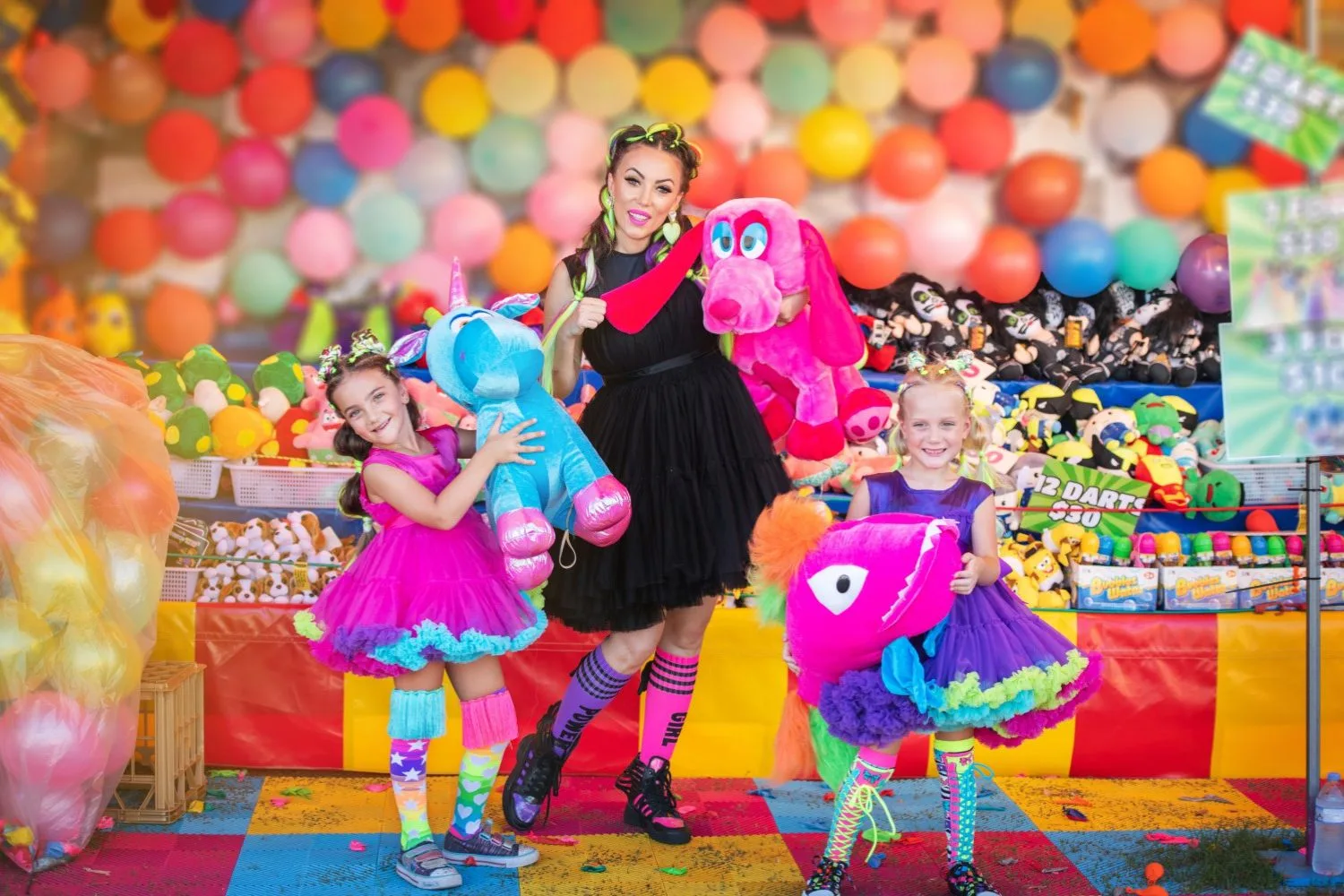 Woman at Easter show with two kids wearing colourful socks