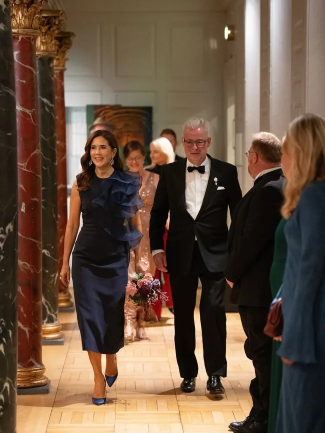 Queen Mary wearing Carla Zampatti