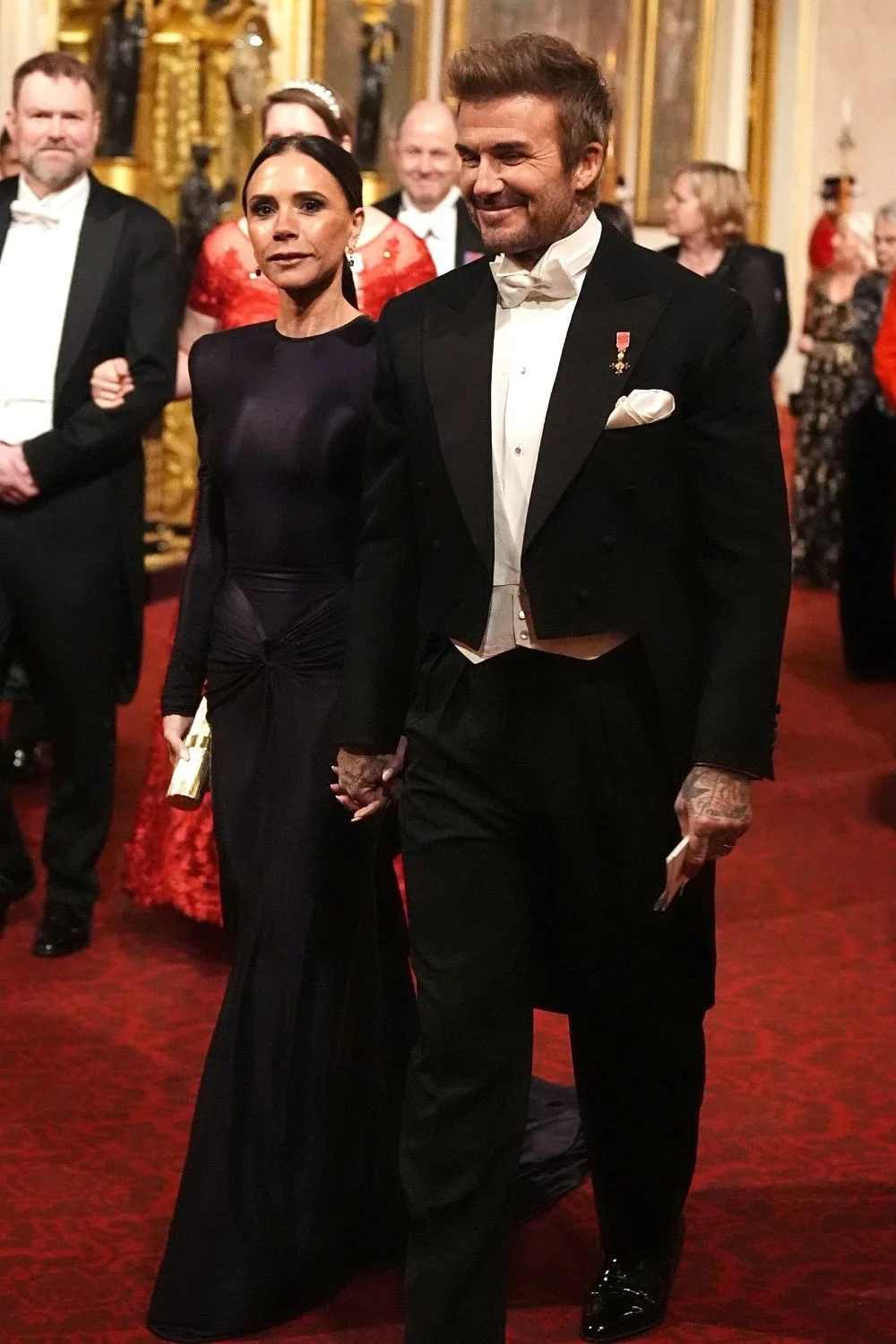 David and Victoria Beckham attend a state dinner at Buckingham Palace 