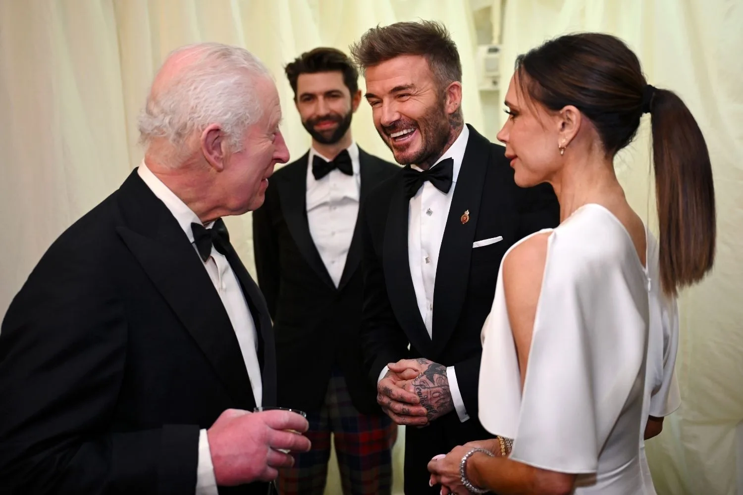 David and Victoria Beckham with King Charles 