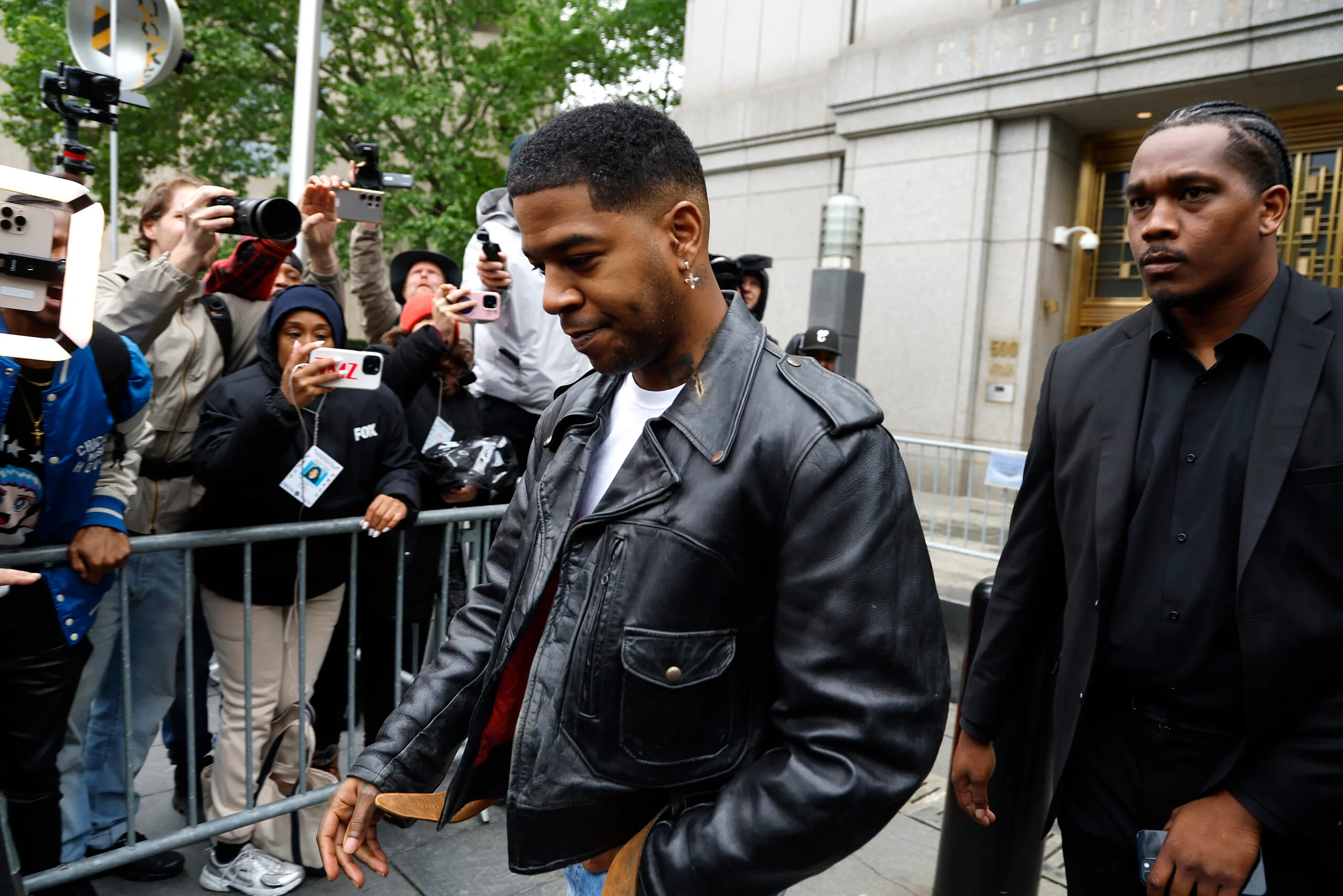 p diddy trial - NEW YORK, NEW YORK - MAY 22: Kid Cudi  departs the Manhattan Federal Court during the Sean "Diddy" Combs' trial on May 22, 2025 in New York City. Combs, 55, has pleaded not guilty on all counts, which include a racketeering charge alleging the hip-hop pioneer was the leader of a sex crime ring that included drug-fueled sex parties through the use of force, threats and violence (Photo by John Lamparski/Getty Images)
