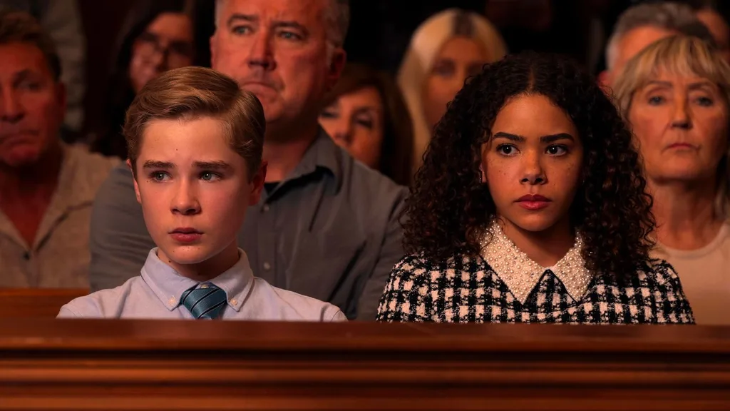 ginny and georgia season ginny and austin sit at georgia's trial in a courtroom