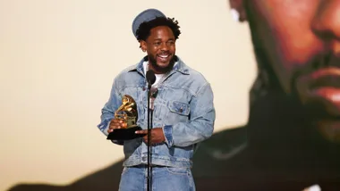 kendrick lamar is coming to australia 2025 after winning five grammys, as pictured here on stage
