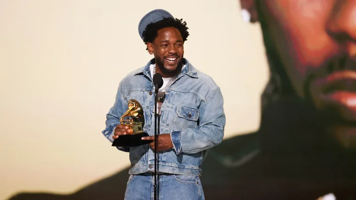 kendrick lamar is coming to australia 2025 after winning five grammys, as pictured here on stage