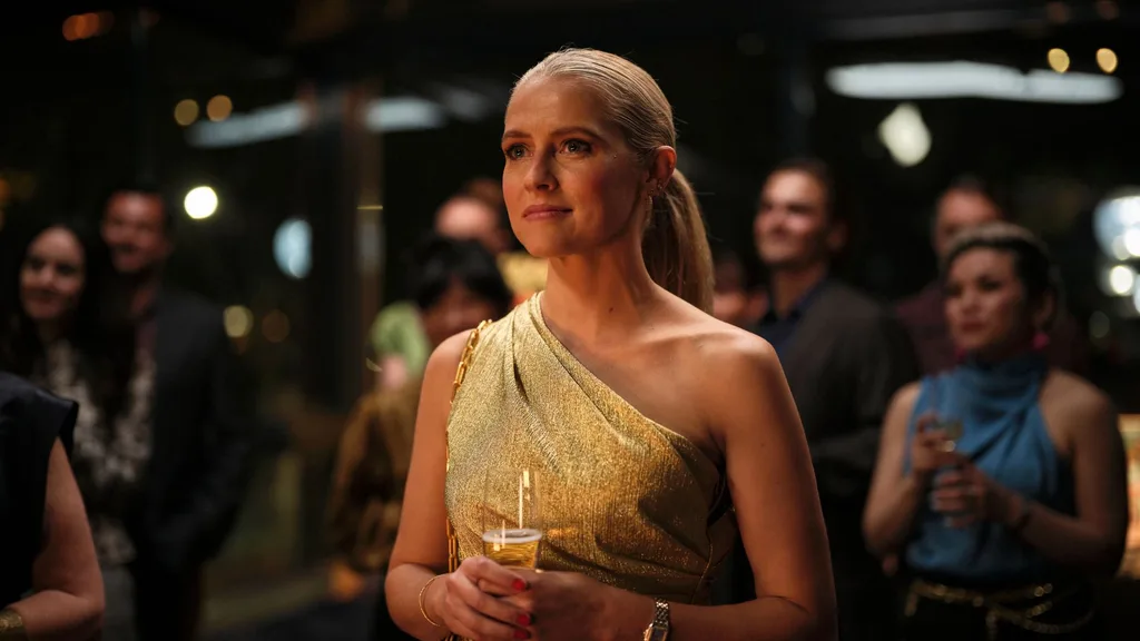 teresa palmer in mix tape wearing a gold dress