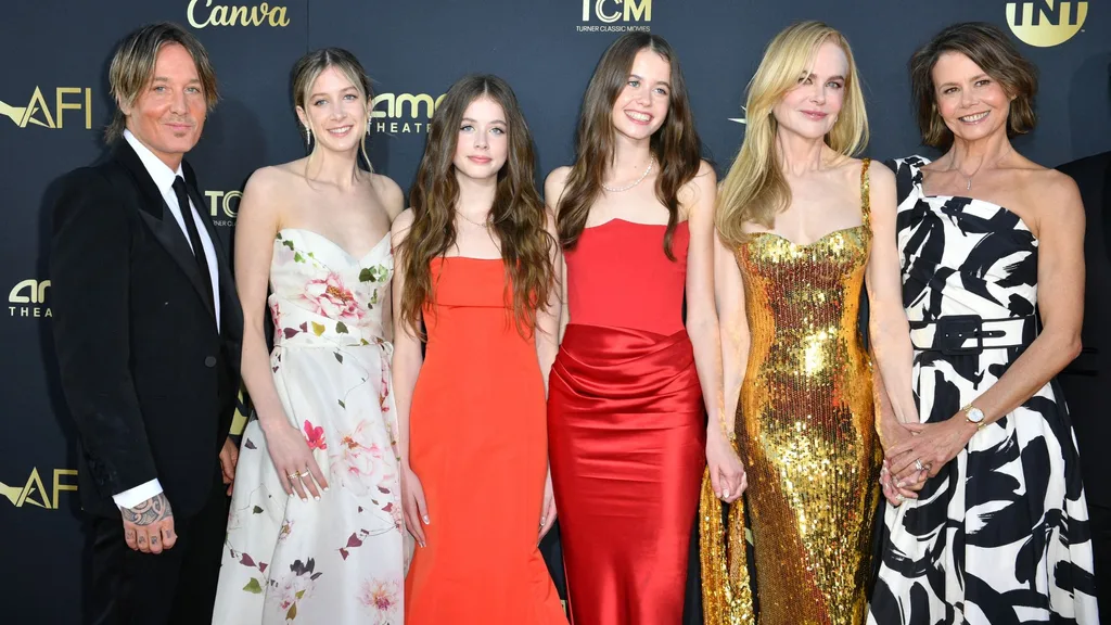 nicole kidman and keith urban with their kids and family on a red carpet