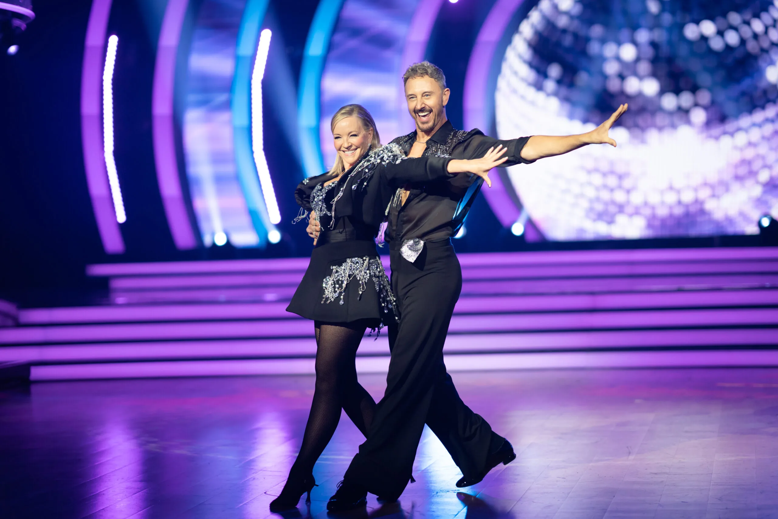 rebecca gibney and her partner performing in episode 1