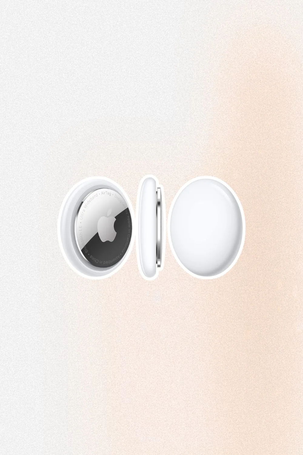 Three round white Apple AirTags Amazon Prime Day