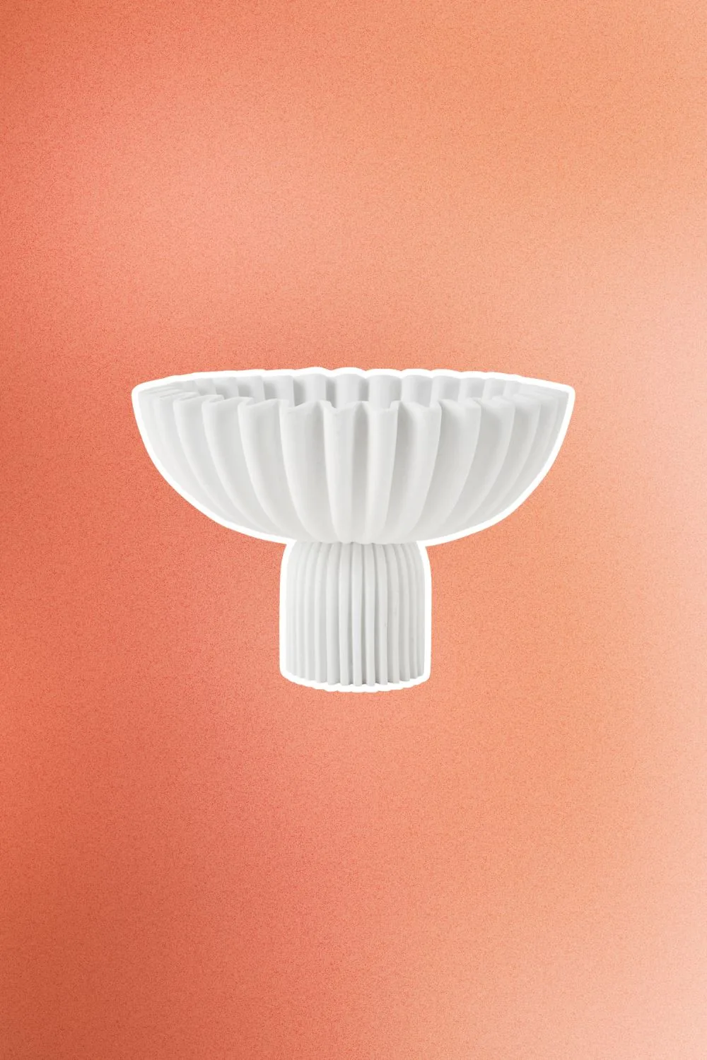White bowl with pleated edges.