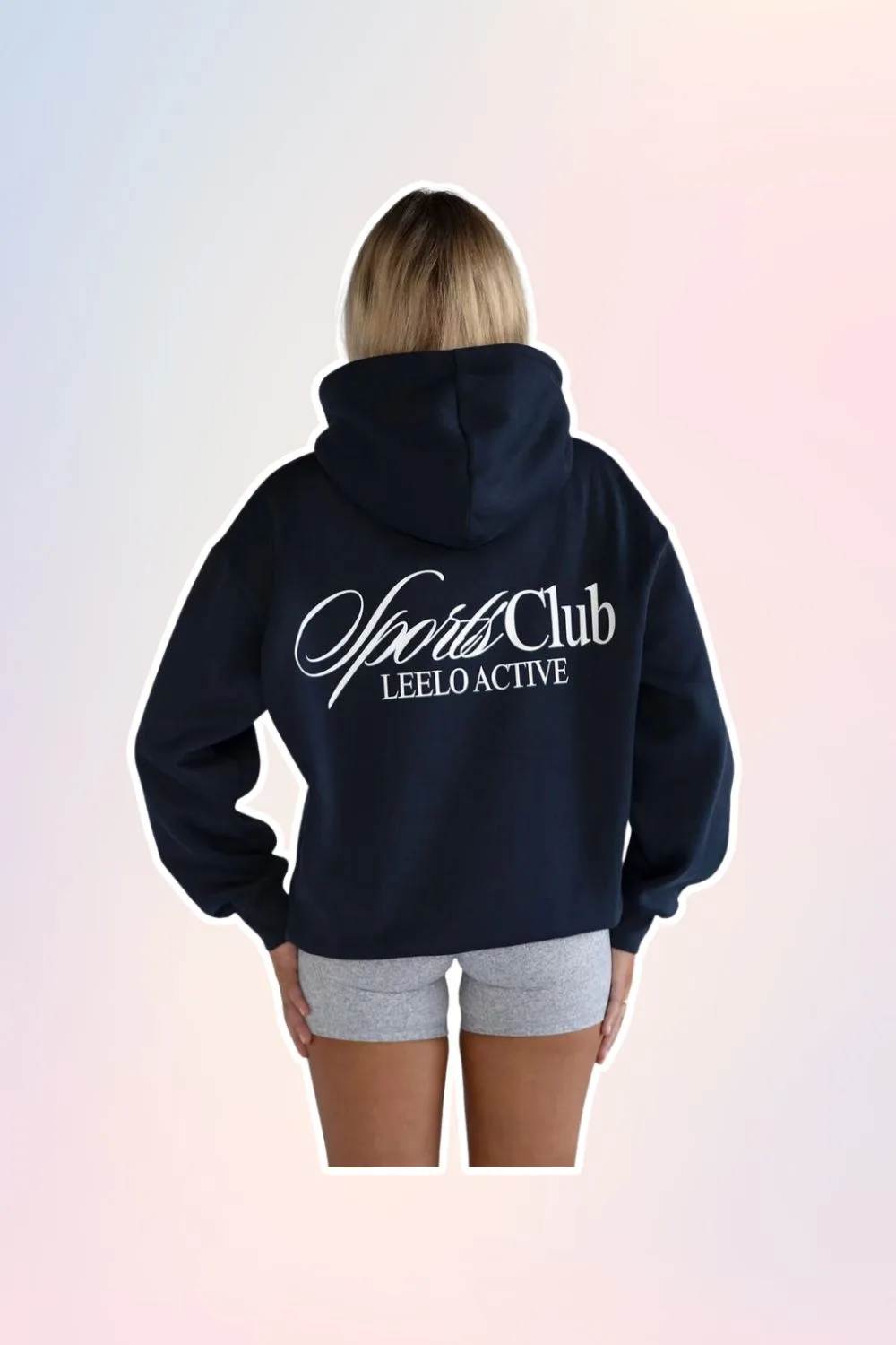 Navy blue hooded jumper with the words "sports club" on the back.