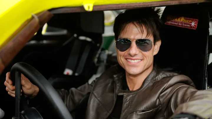 tom cruise poses with days of thunder car ahead of days of thunder 2 sequel