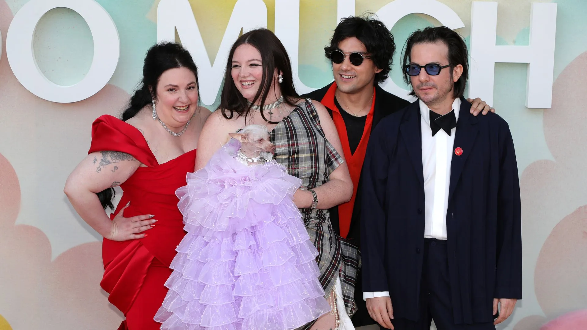 lena dunham, megan stalter, will sharpe, and luis felber pose together on the red carpet of the too much premiere
