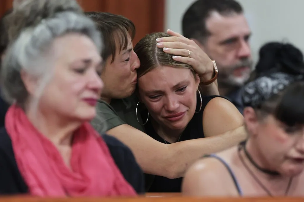 survivors and family members of the victims in court