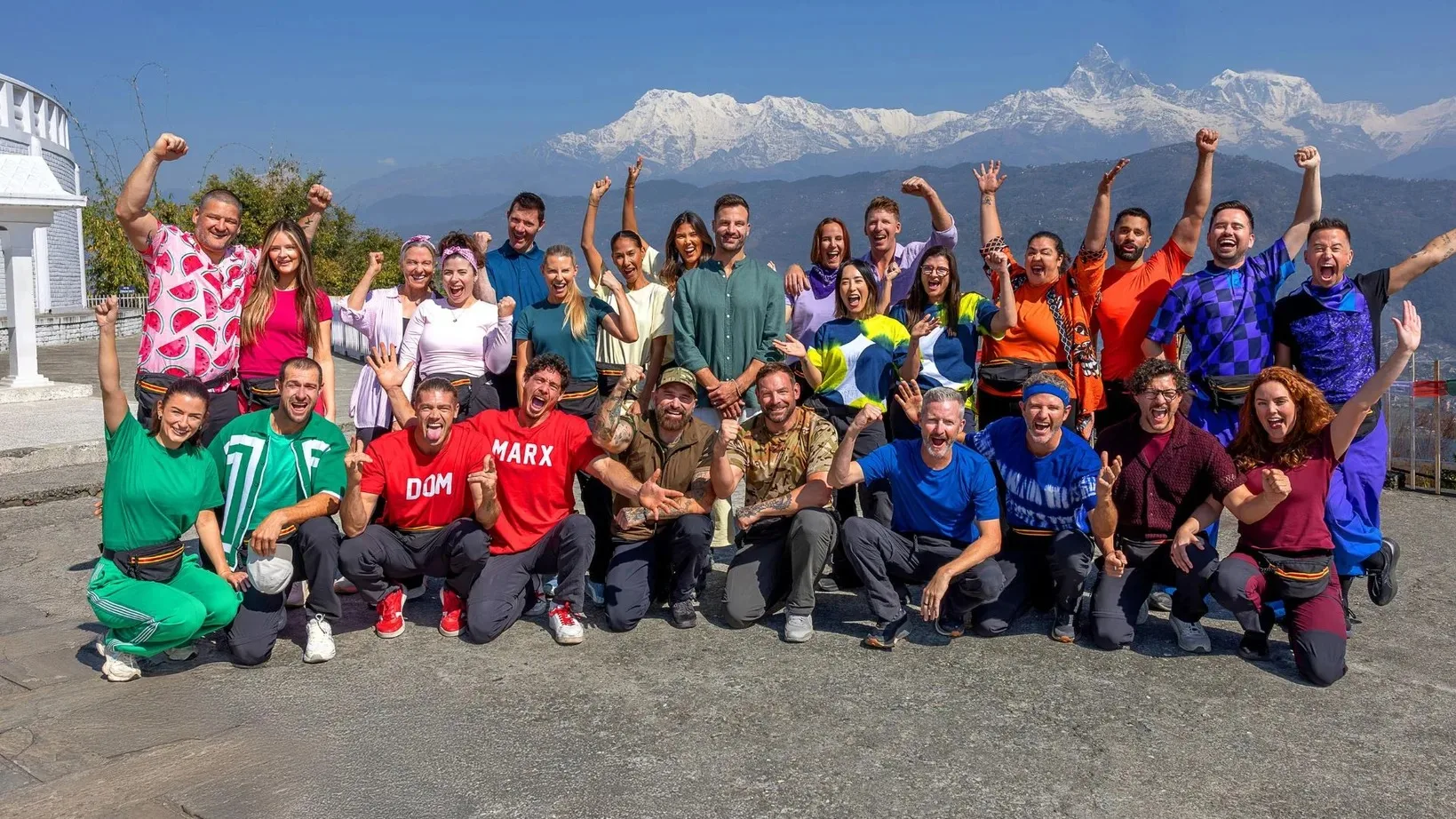 the thirteen teams for the amazing race australia celebrity edition in nepal with a mountain view