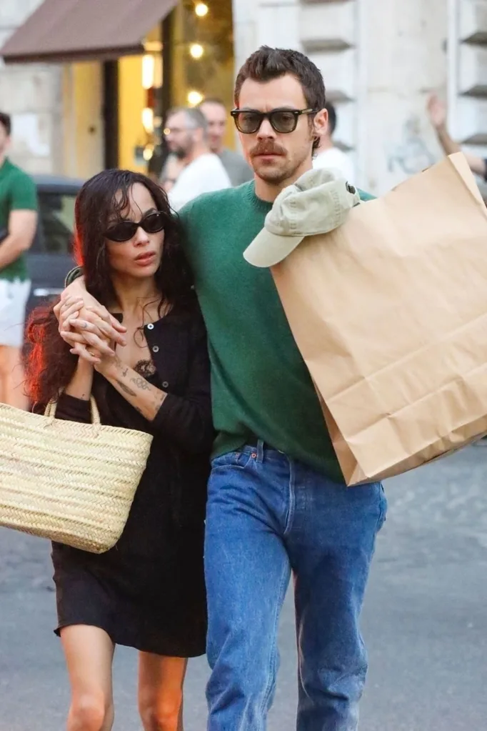 harry styles and zoe kravitz walking with groceries in rome