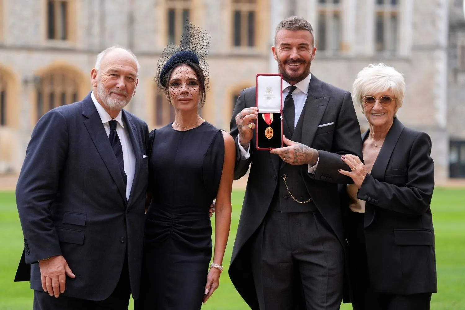 David Beckham with his wife and parents