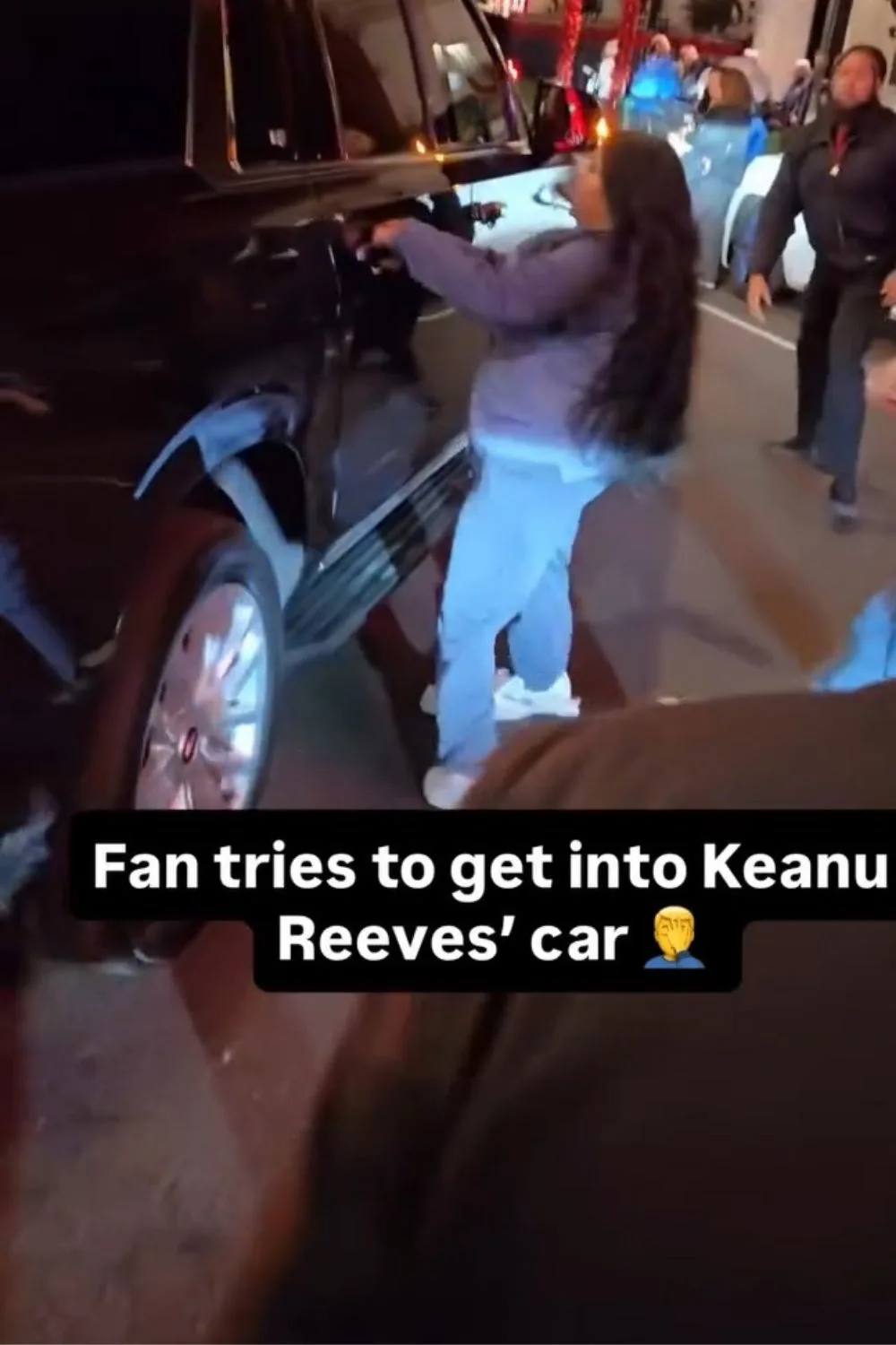 a screenshot from social media of a girl holding onto a car handle door.