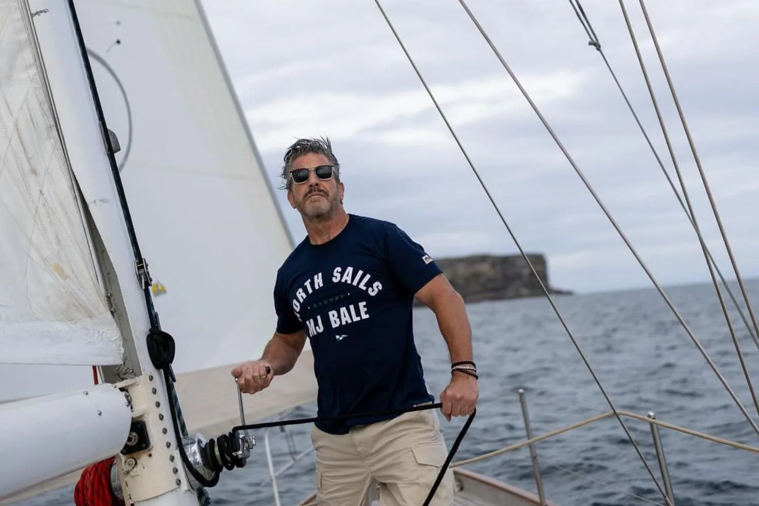 Bear Myrden sailing a yacht in an Instagram photo