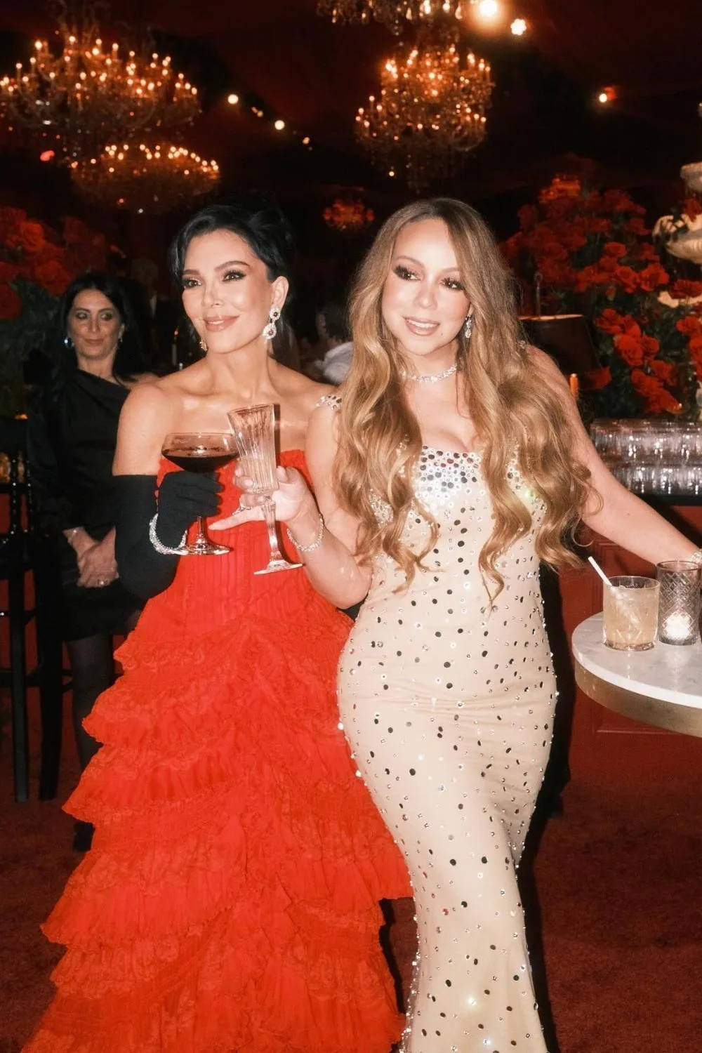 kris jenner and mariah carey posing
