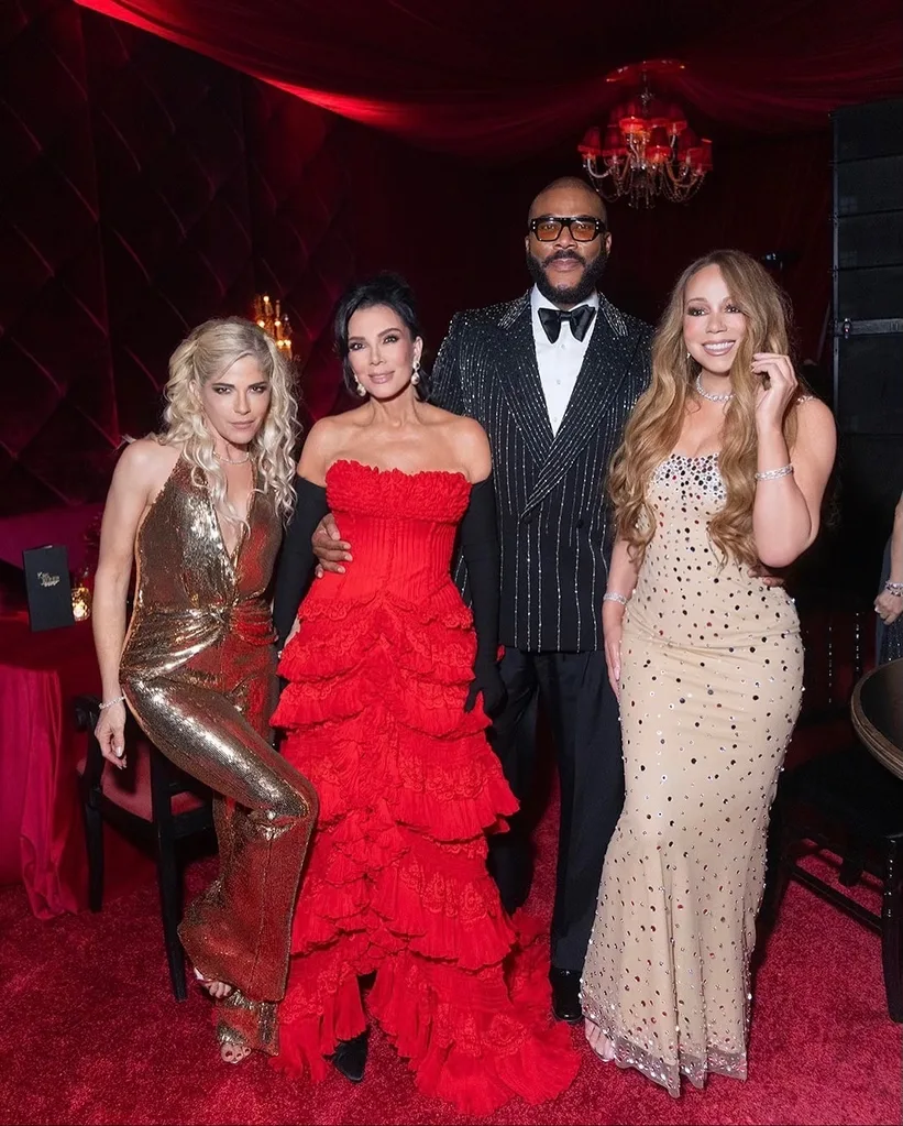 selma blair, kris jenner, tyler perry and mariah carey posing together at kris' party looking glammed up on a red carpet