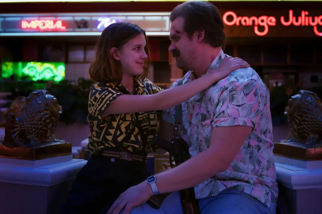 Millie Bobby Brown and David Harbour on the set of Stranger Things