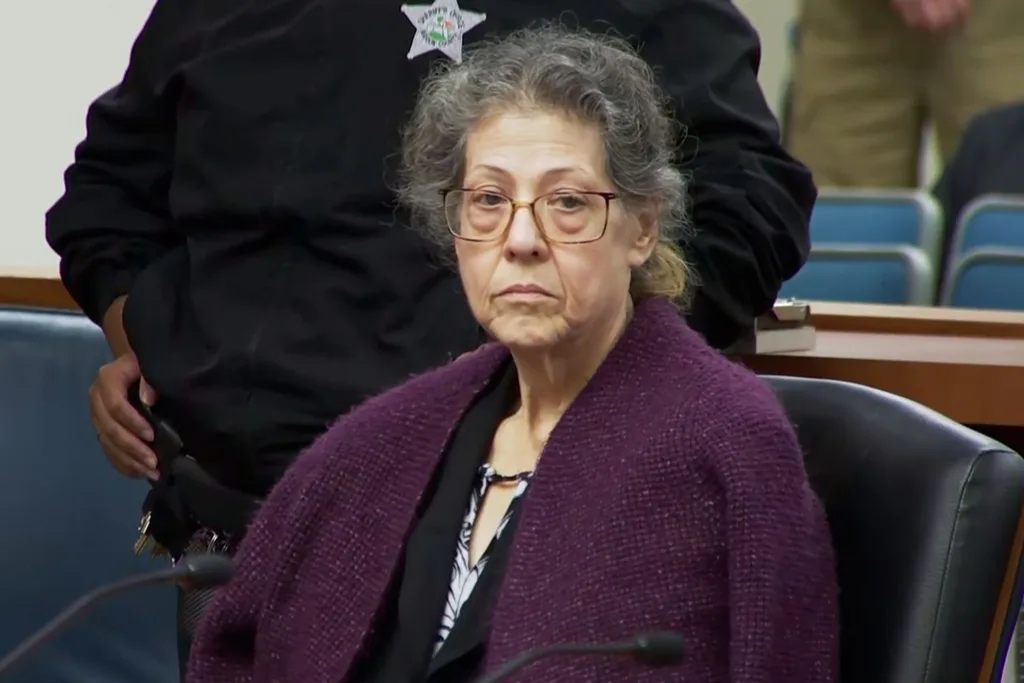 susan lorincz sitting in court with an expressionless face