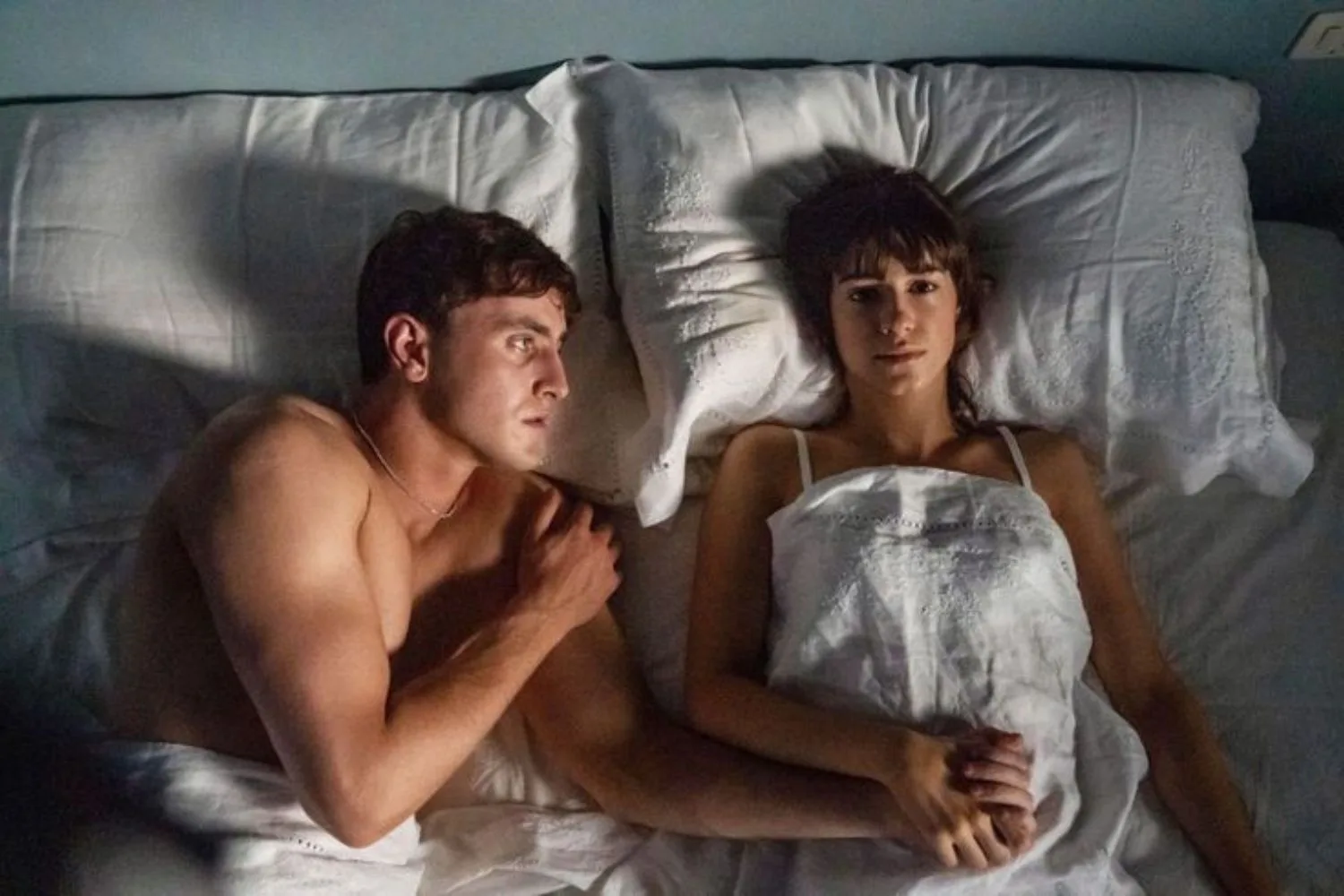 Paul Mescal and Daisy Edgar-Jones lying in bed in Normal People.