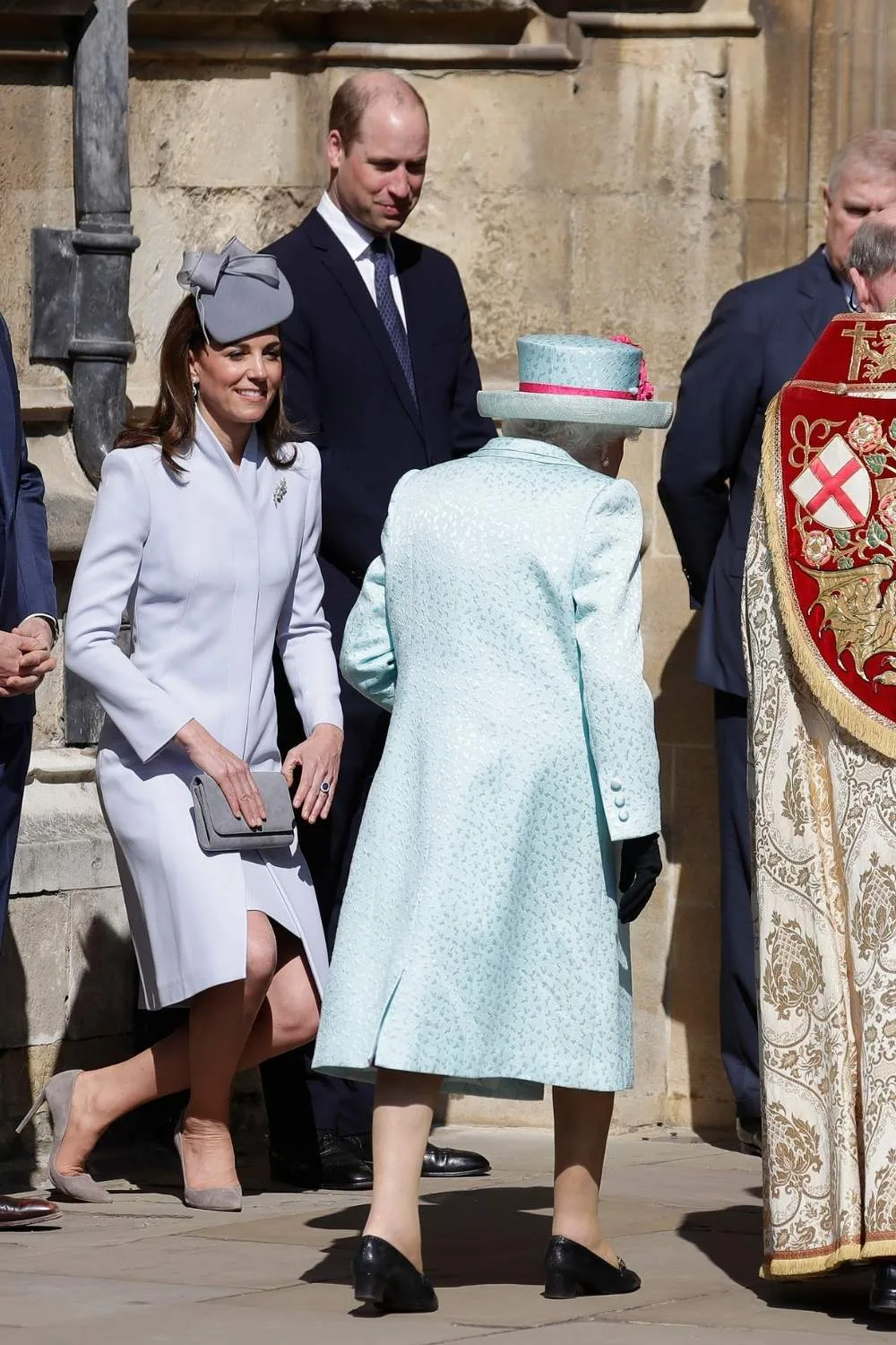 Kate curtsying to Queen Elizabeth 