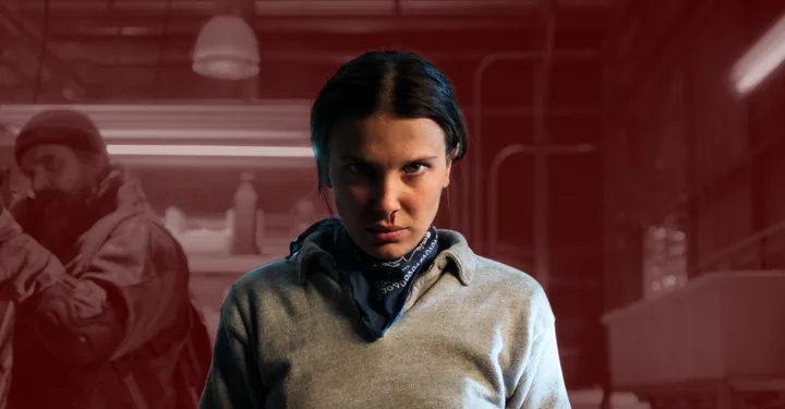 eleven with a bleeding nose looking sternly at the camera