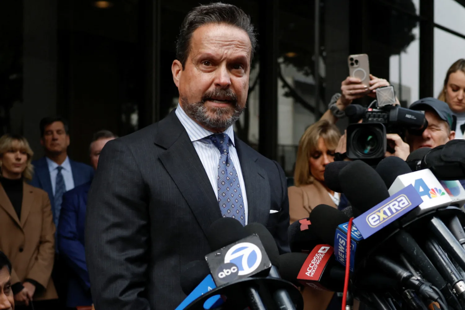 Alan Jackson talks to press outside the courtroom./Pic: Getty