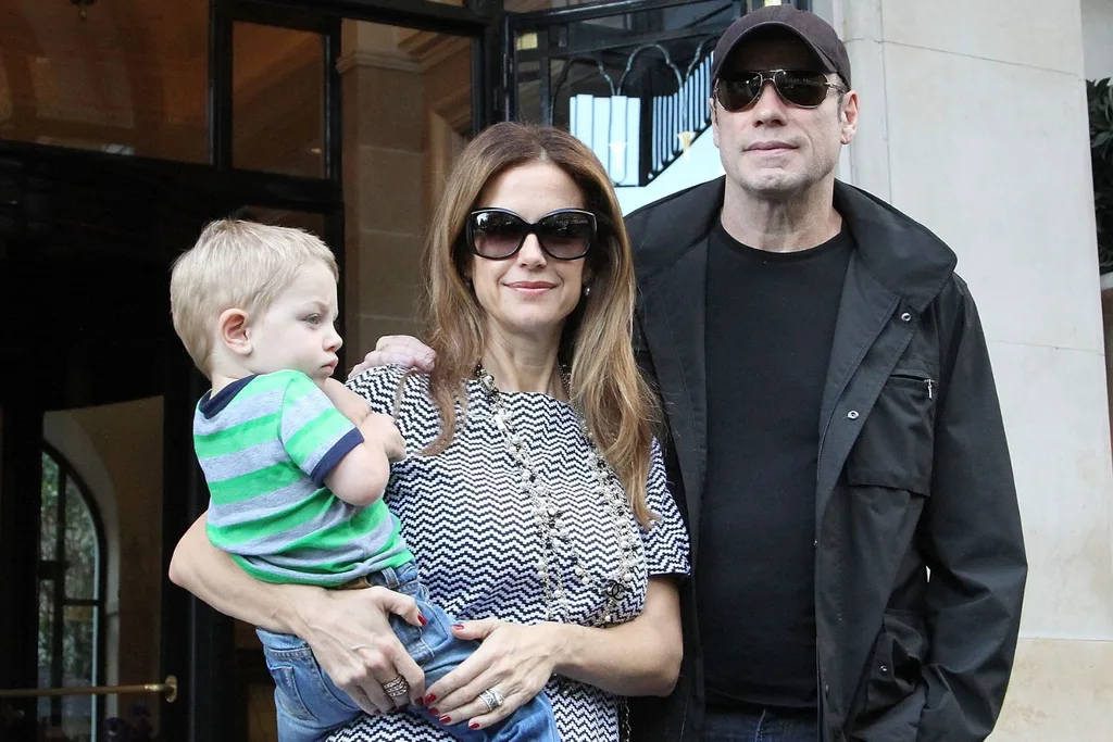 ohn Travolta, his wife Kelly Preston and their son Benjamin/Pic: Getty