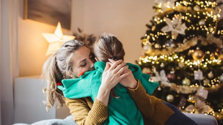 Mother hugging a child