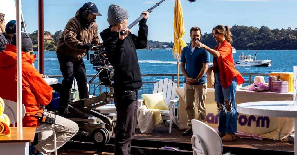 a film crew filming sunny nights near sydney harbour