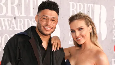 Perrie Edwards and Alex Oxlade Chamberlain. Pic: Getty