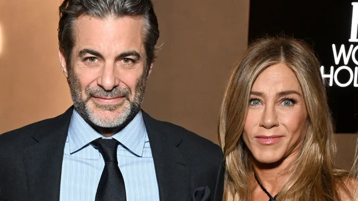 Jim Curtis and Jennifer Aniston. Pic: Getty