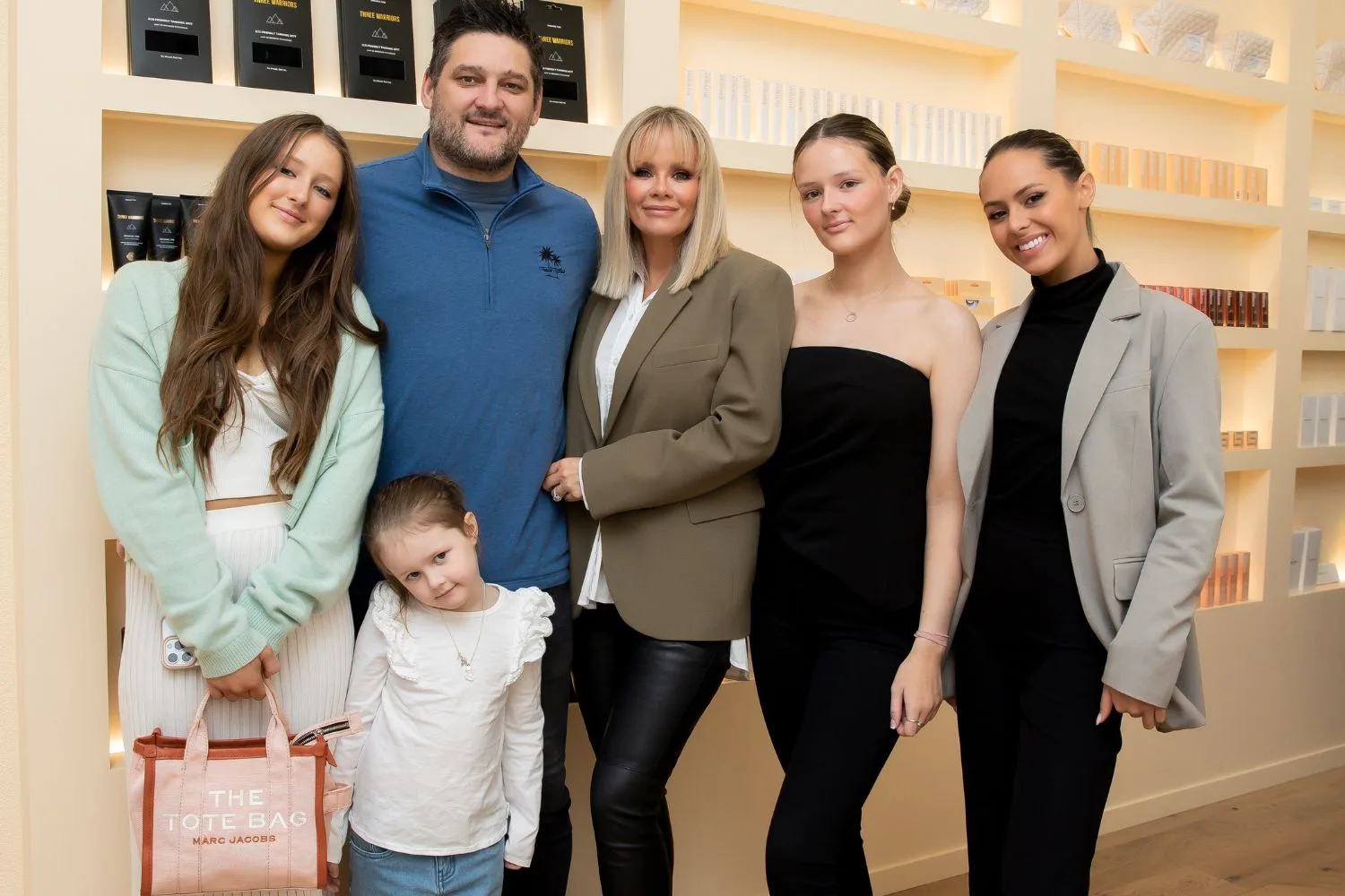 Brendan and Alex Fevola with their children. 