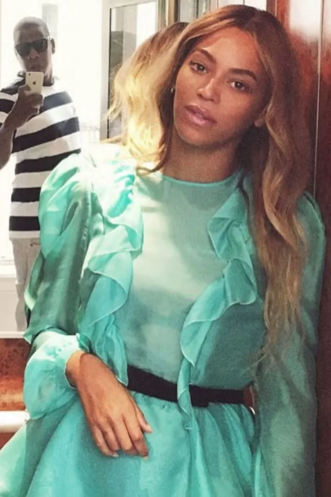 Jay-Z snaps a picture of Beyonce.