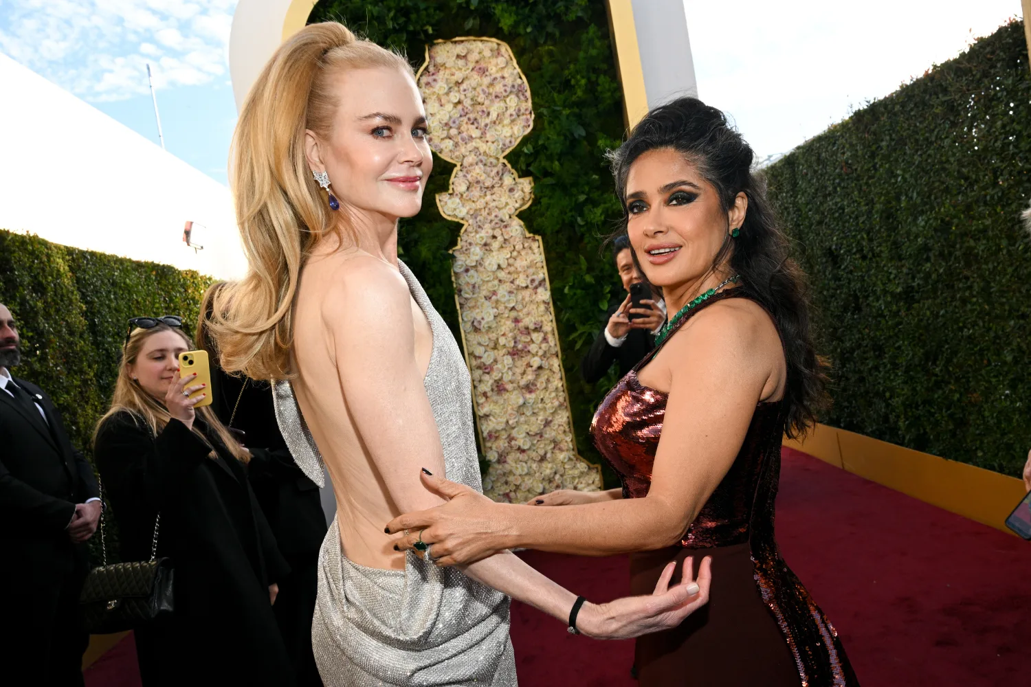 Nicole Kidman and Salma Hayek at the Golden Globes in 2025 