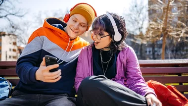 a young couple listen to music