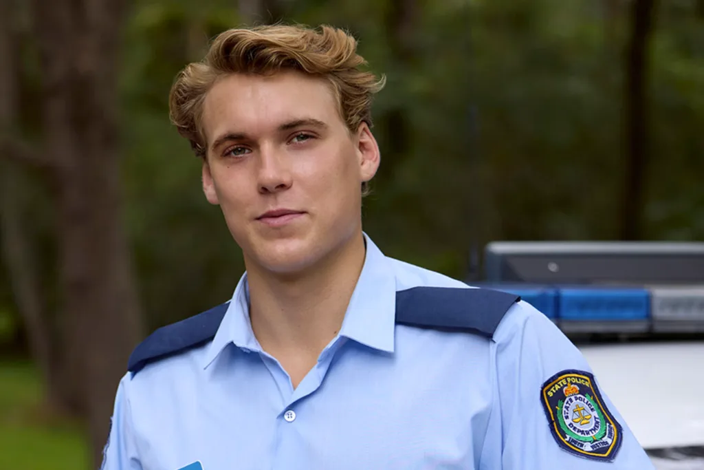 Home and Away Richie wearing his police uniform.
