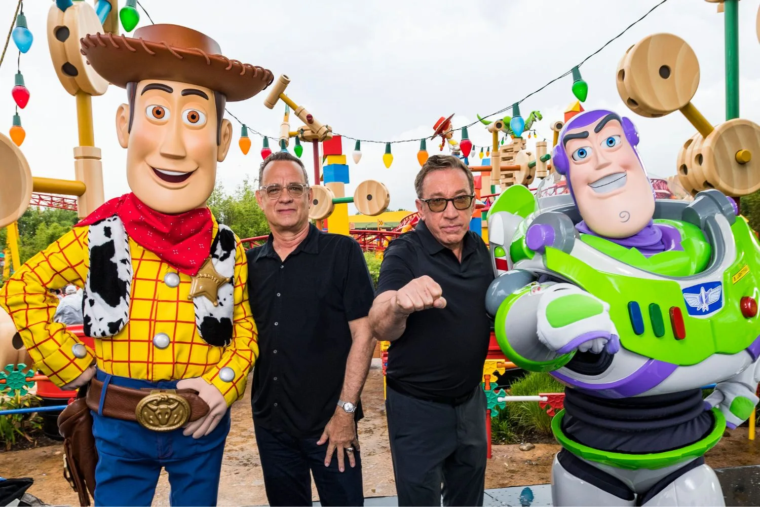 Tom Hanks and Tim Allen with Woody and Buzz Lightyear. Pic: Getty