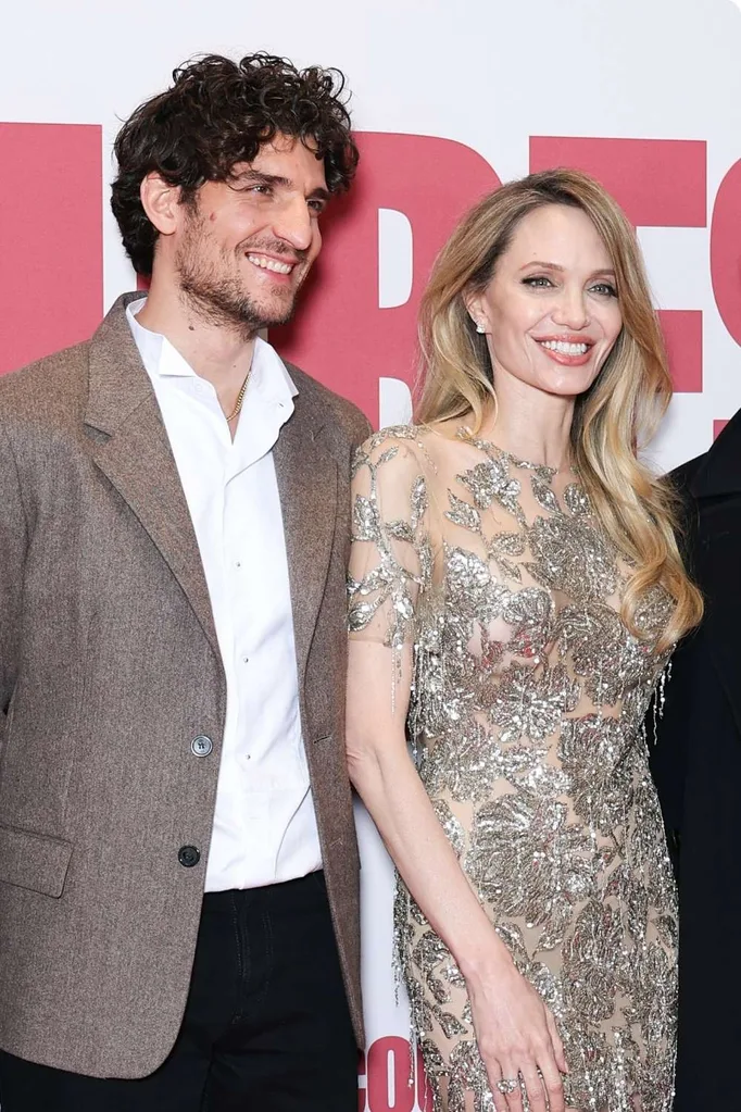 Angelina Jolie and Louis Garrel on a red carpet