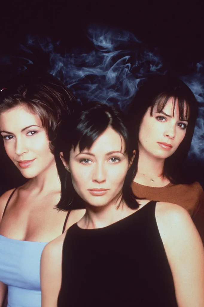 Witchcraft: Three women posing a smiling for the series 'Charmed'.
