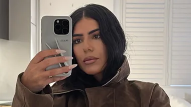 Carina Mirabile taking a selfie in the mirror.