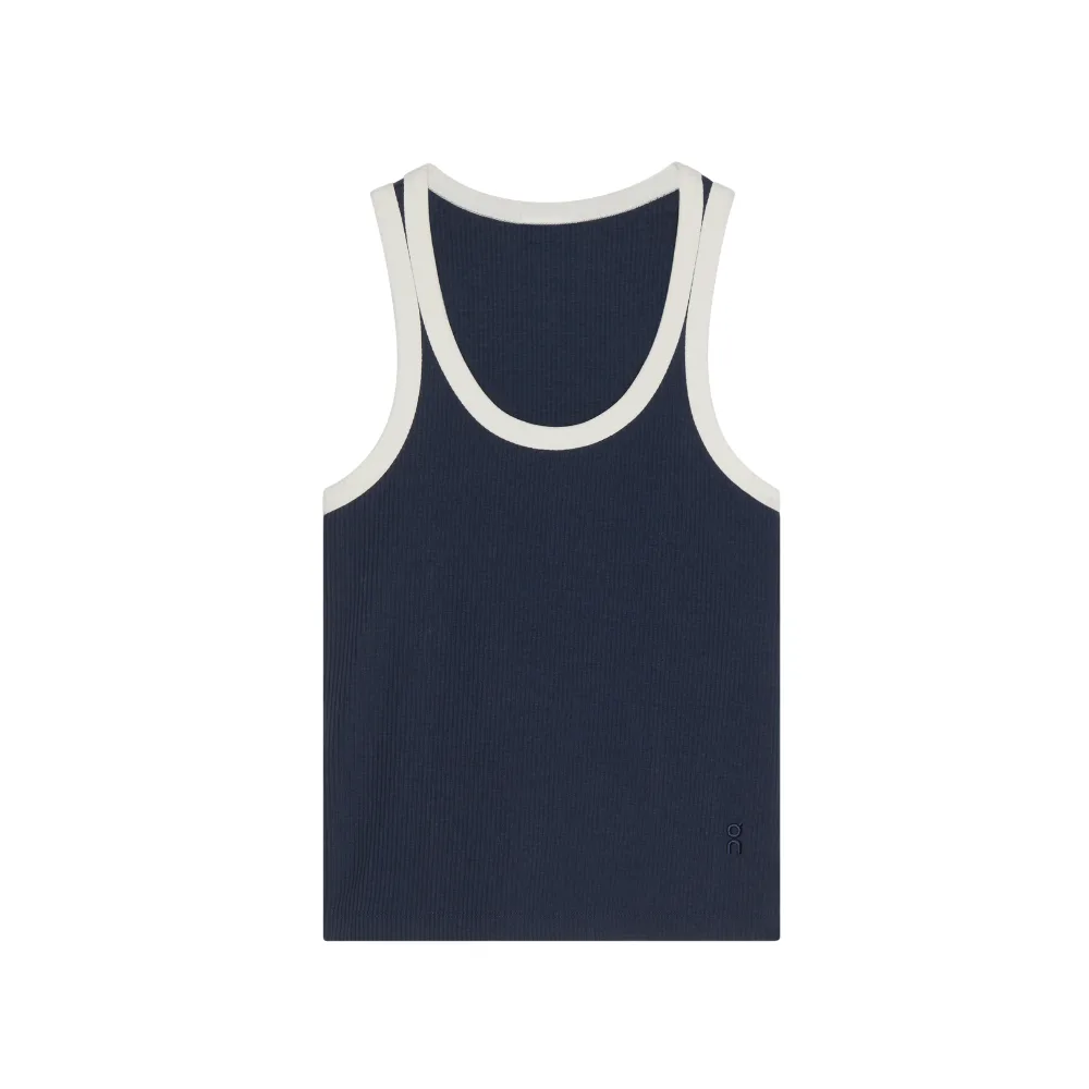 Zendaya x On blue tank top with white piping around the collar
