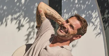 daniel macpherson posing and smiling